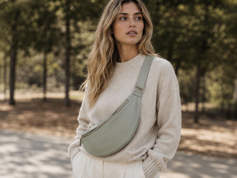 a-female-carrying-a-green-nylon-banana-bag