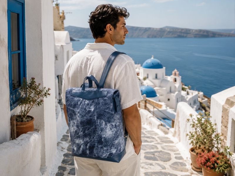 a-man-carrying-a-digital-print-tie-dye-backpack