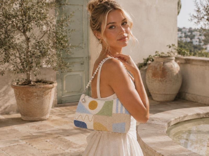 beaded-bag-with-geometric-pattern-carried-by-a-woman