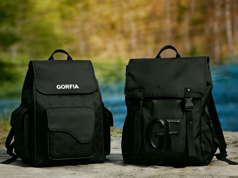 two-black-nylon-backpacks